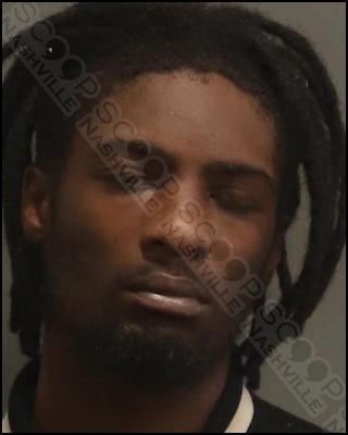 Antione Moore punches his baby mama in nose multiple times while holding their child